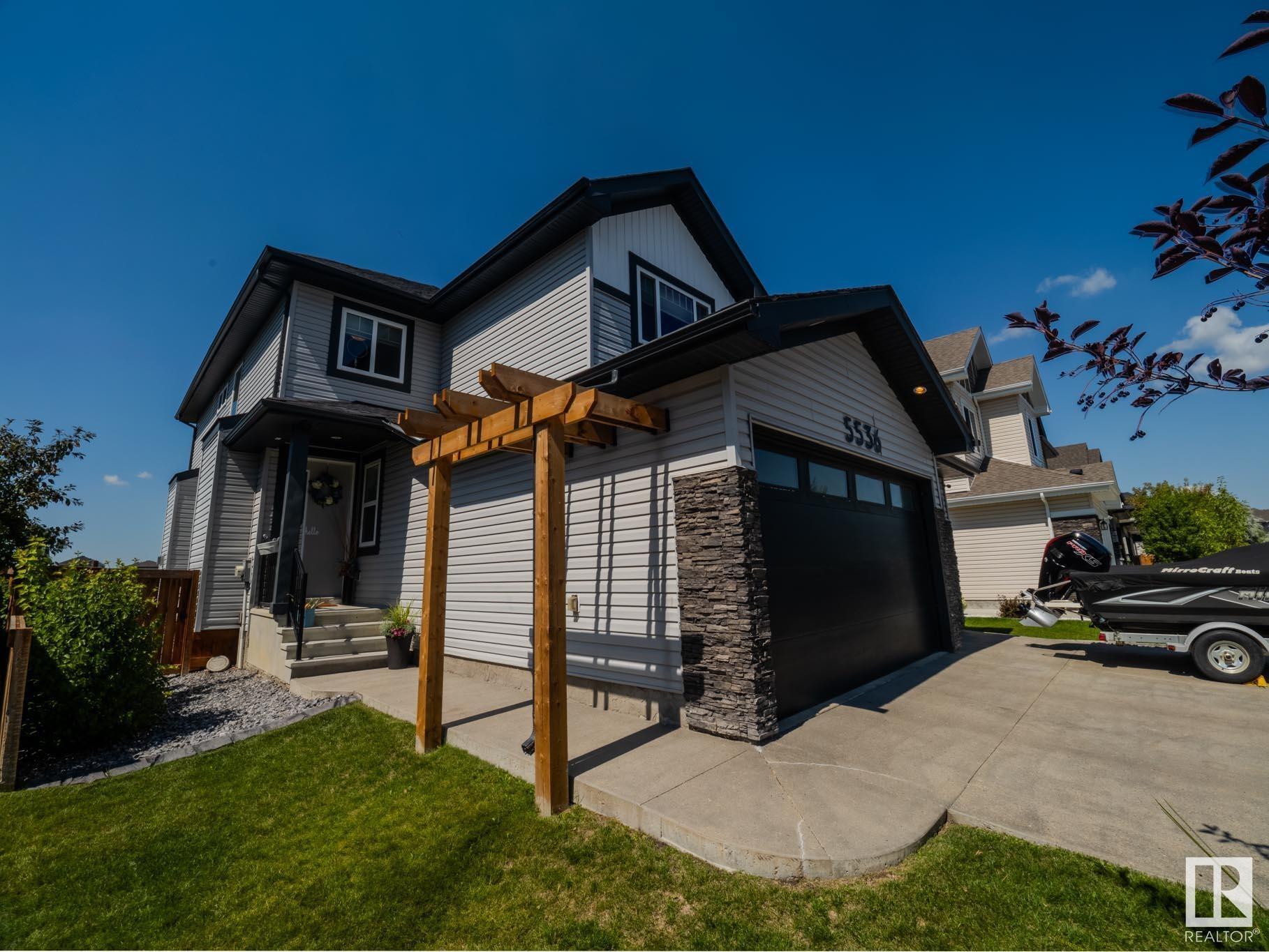 Property Photo: 5536 Poirier Way AB T4X 2B3