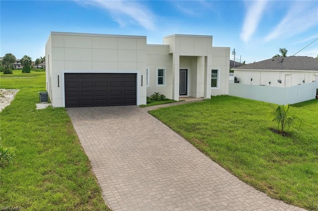 Property Photo: 303 NW 26th Ave FL 33993