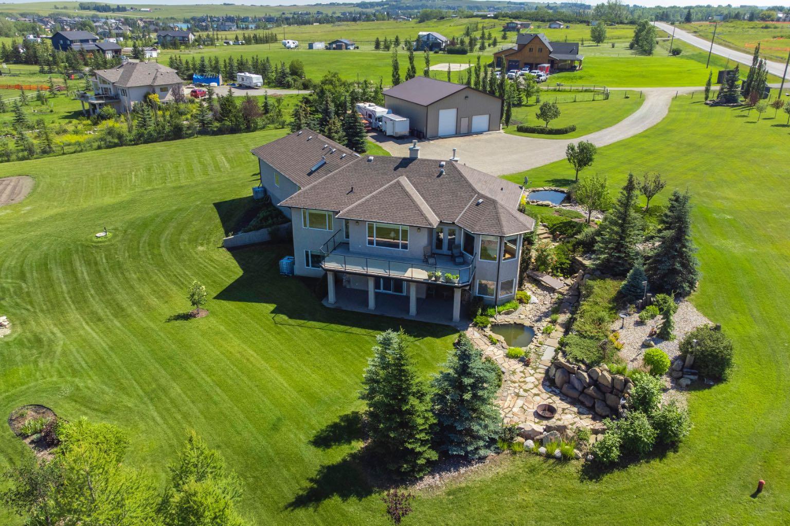 Property Photo:  42210 Cochrane Lake W  AB T4C 2B1 