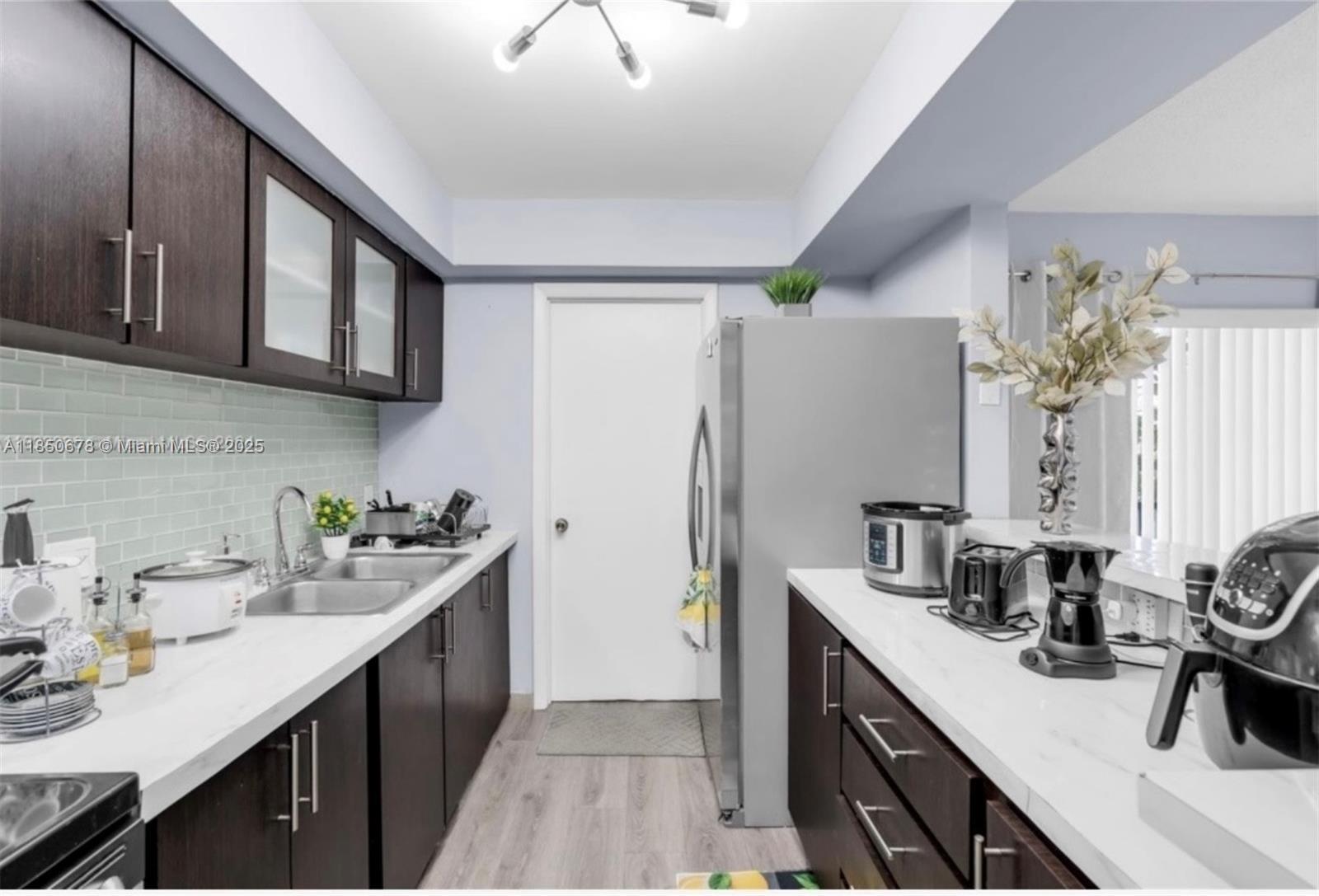 Property Photo: 8401 SW 107th Ave 311E FL 33173