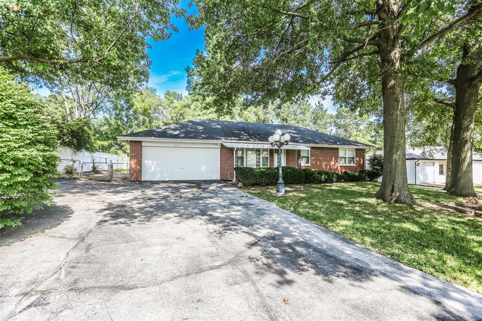 Property Photo:  9864 Winkler Drive  MO 63136 