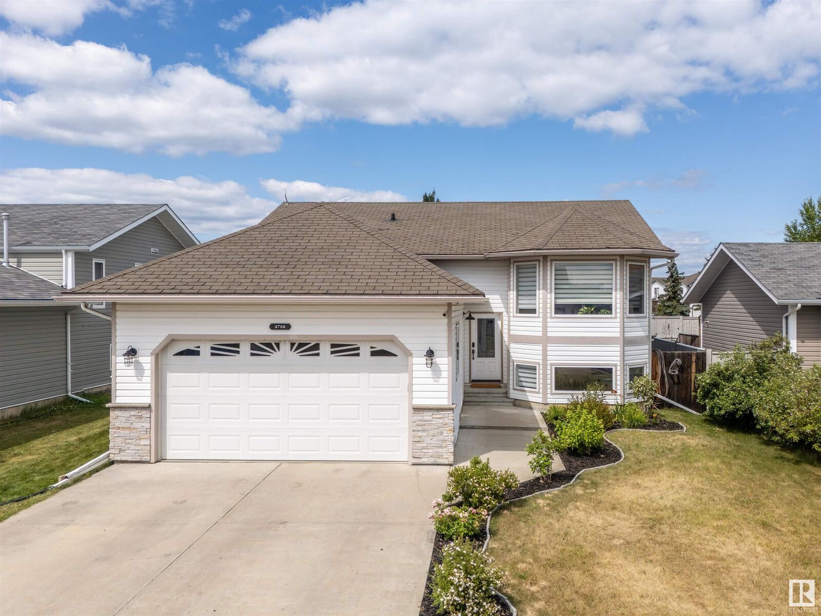Property Photo:  4706 64 Ave  AB T9M 2E5 