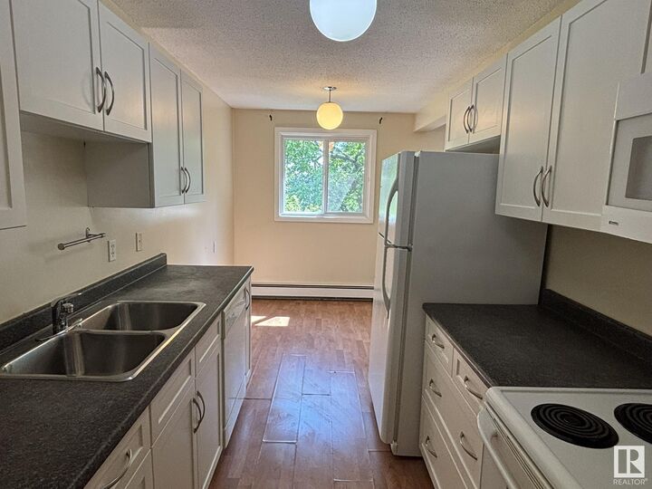 Property Photo:  11308 108 Avenue NW 301  AB T5H 1B6 