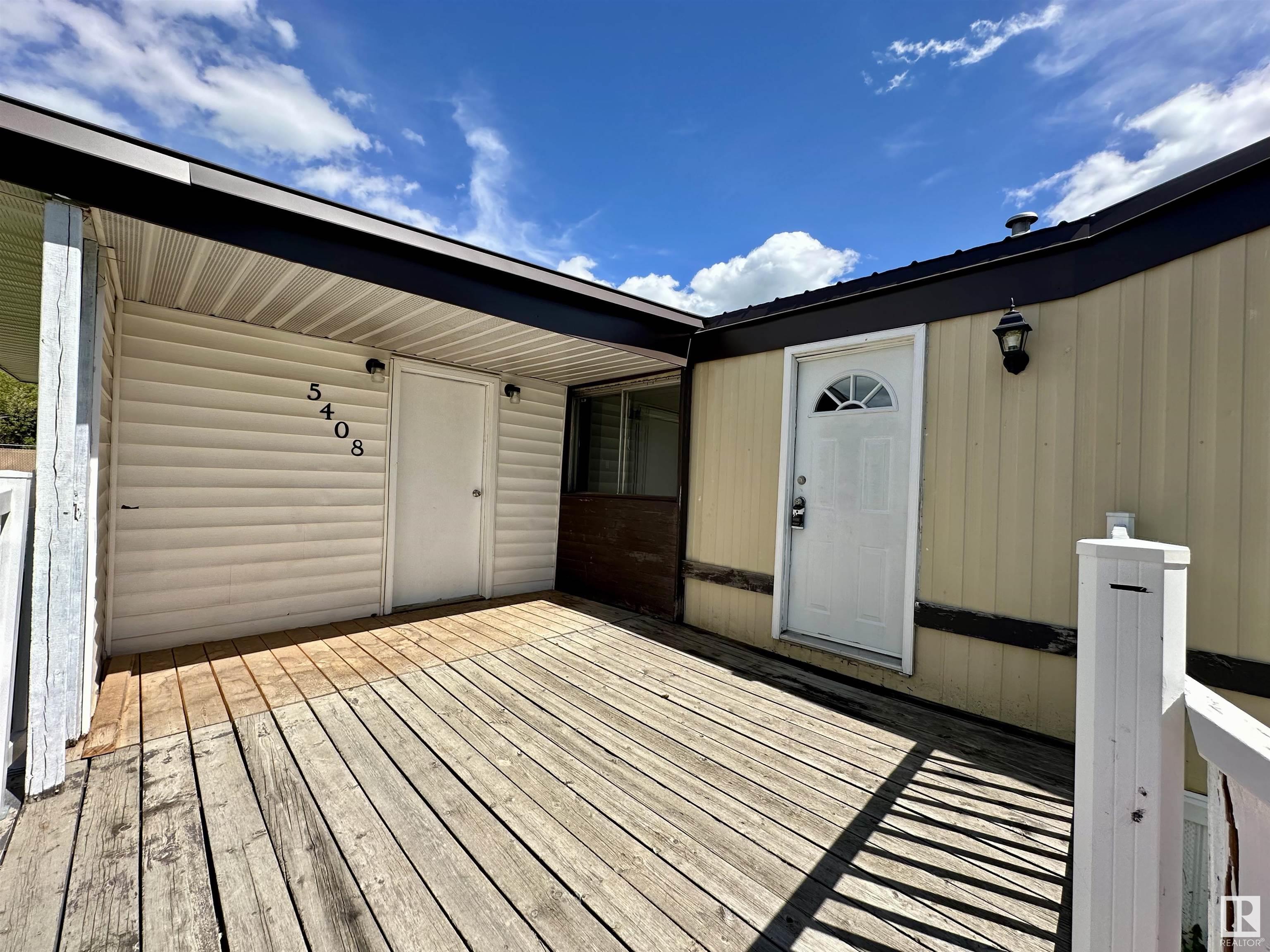 Property Photo: 5408 47 Avenue AB T7A 1K7