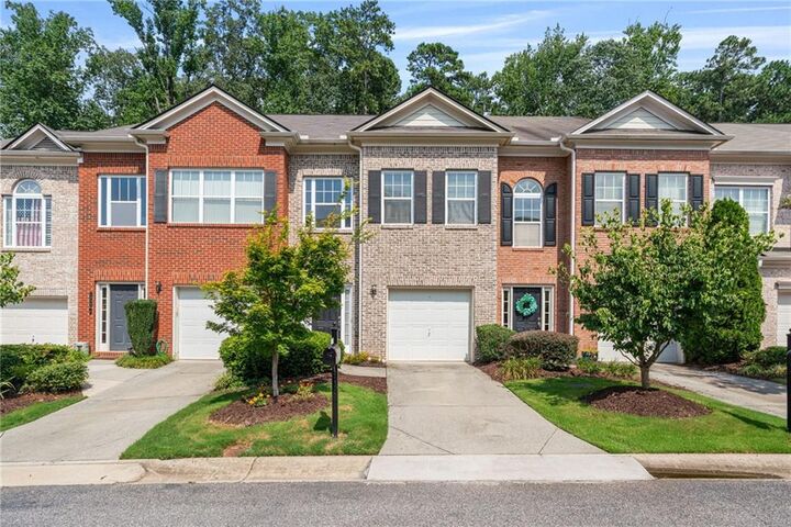 Property Photo:  1030 Firethorne Pass  GA 30040 