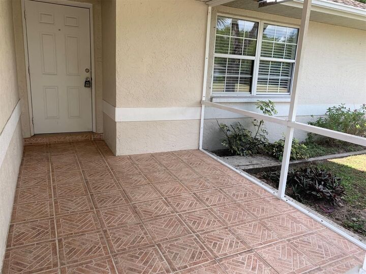 Property Photo: 1427 Hayworth Road FL 33952