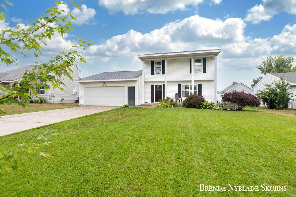 Property Photo:  11834 Deerfield Drive  MI 49451 