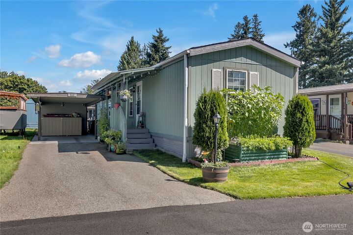 Property Photo:  909  205th Street Ct E 81  WA 98387 