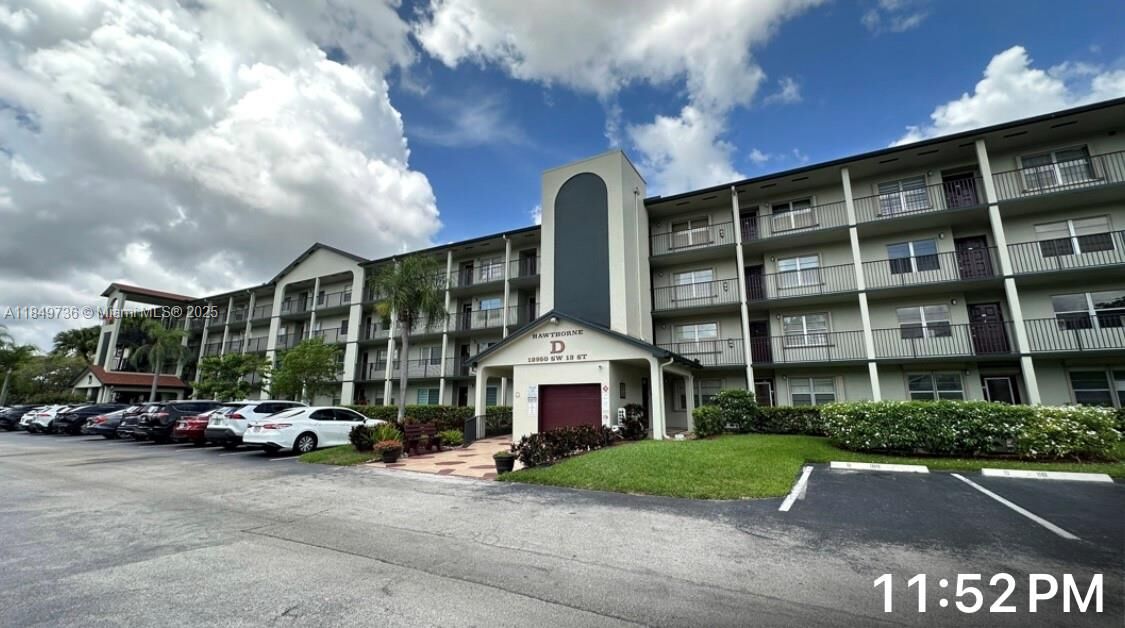 Property Photo: 12950 SW 13th St 412D FL 33027