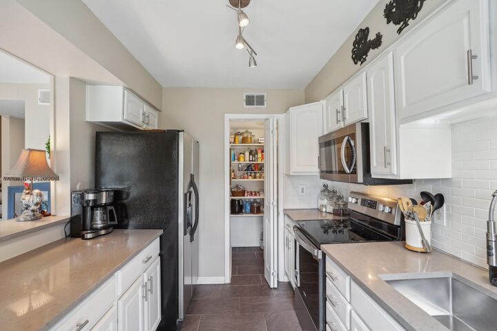 Property Photo:  6355 Del Monte Drive 64  TX 77057 