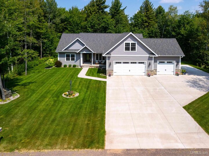 Property Photo:  1064 Highland Drive  MI 49849-3346 