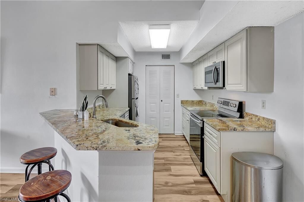 Property Photo:  13615 Eagle Ridge Dr 1633  FL 33912