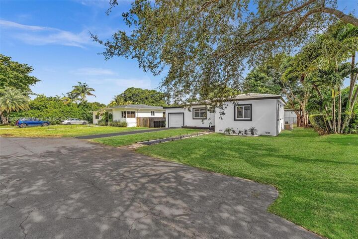 Property Photo: 141 NW 89th St FL 33150