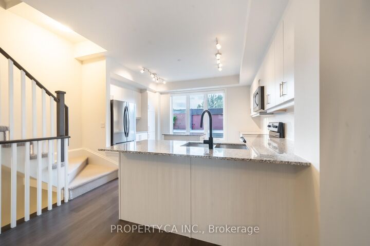 Property Photo: 80 Eastwood Park Gardens 9 ON M8W 0B2