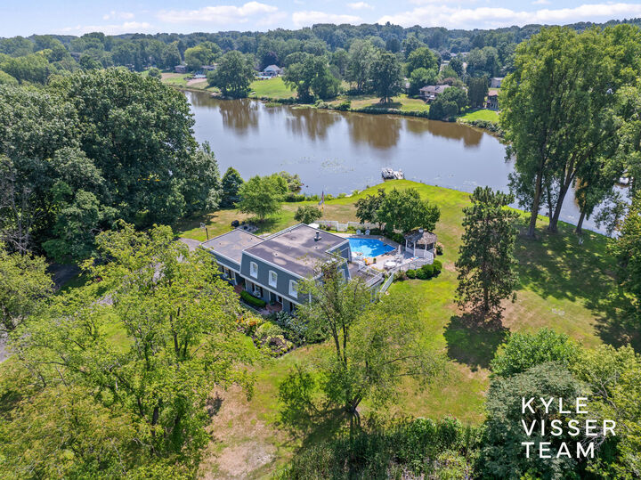 Property Photo:  4090 Fulton Street E  MI 49546 