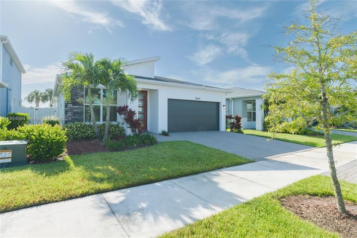 Property Photo: 10669 SW Gloriana St FL 34987
