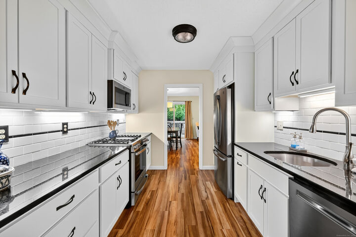 Property Photo:  381 The Meadows 381  CT 06082 