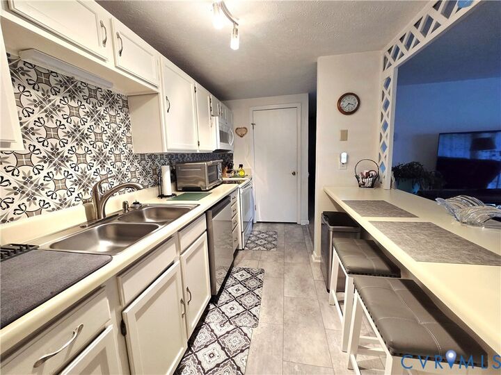 Property Photo:  7701 Okeith Court 1604  VA 23228 