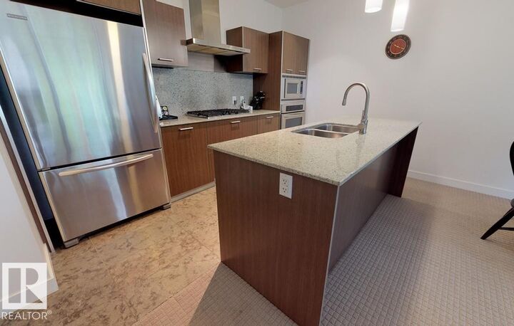 Property Photo:  2510 109 Street NW 110  AB T6J 2X1 