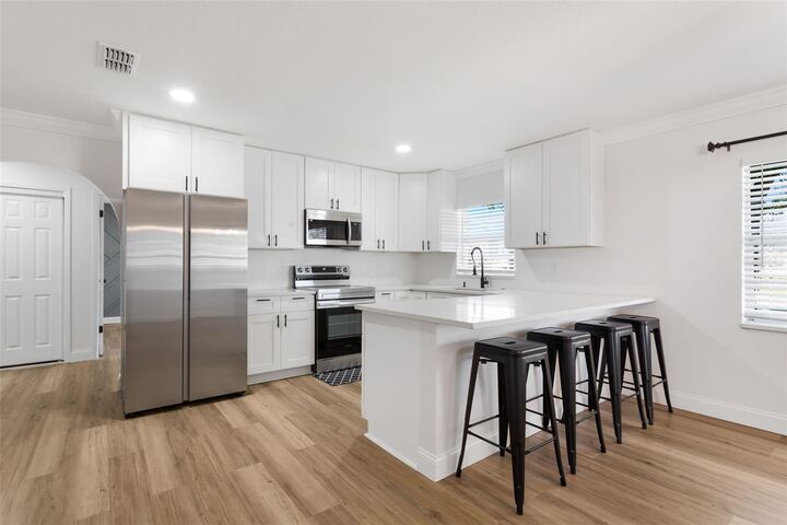 Property Photo:  4420 W Carmen Street  FL 33609 