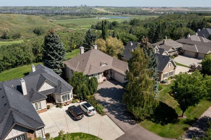 Property Photo:  33 Ridge Pointe Drive  AB T1S 4H1