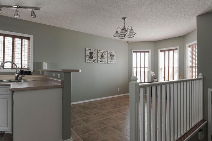 Photo de la propriété:  140 Waterhouse Street  AB T9K 2T2 