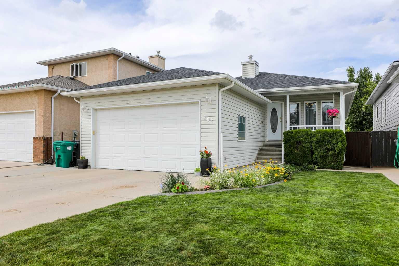 Property Photo: 203 Stafford Boulevard N AB T1H 6K8