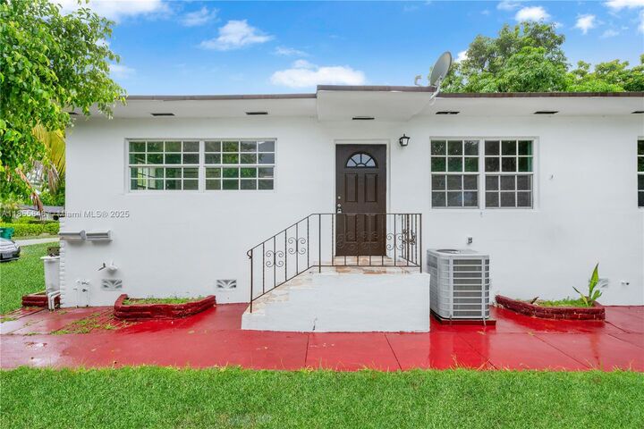Property Photo: 1245 NE 117th St 1 FL 33161