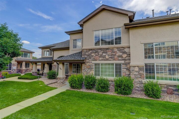 Property Photo: 1375 S Chambers Road 104 CO 80017