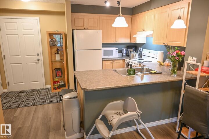 Property Photo: 630 McAllister Loop SW 113 AB T6W 1N1