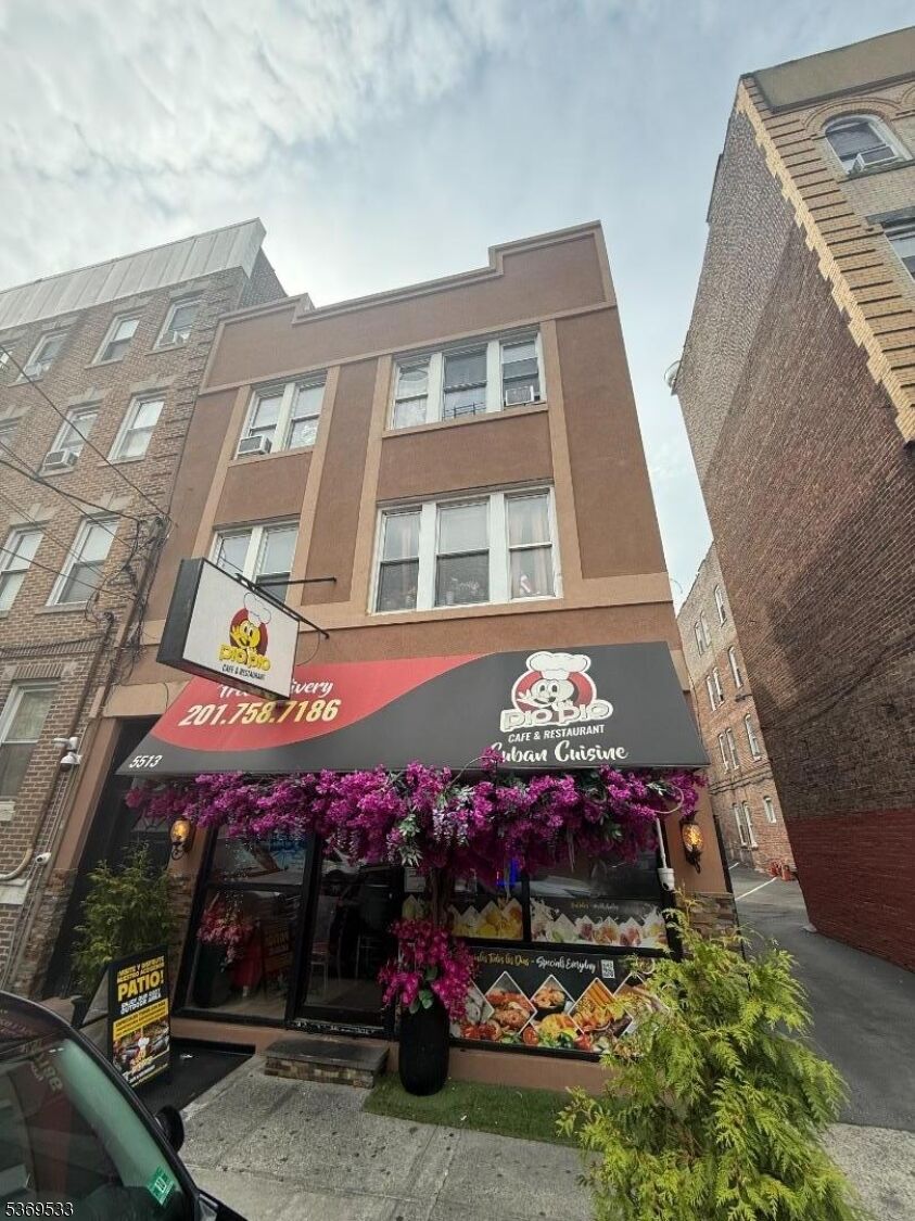 Property Photo:  5513 Hudson Ave  NJ 07093 