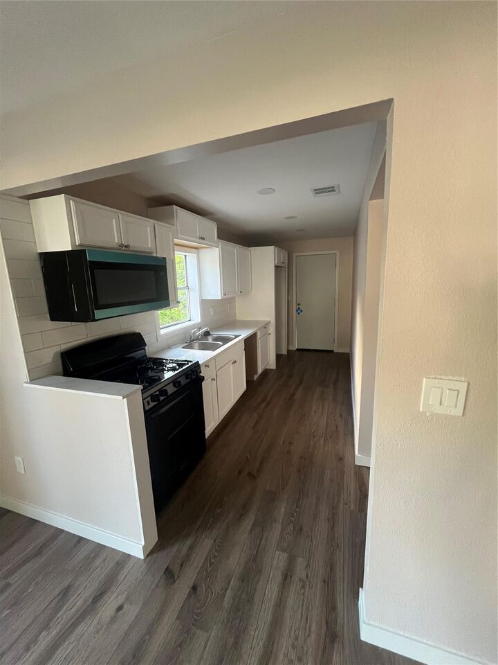 Property Photo:  222 E Adoue Street  TX 77520 