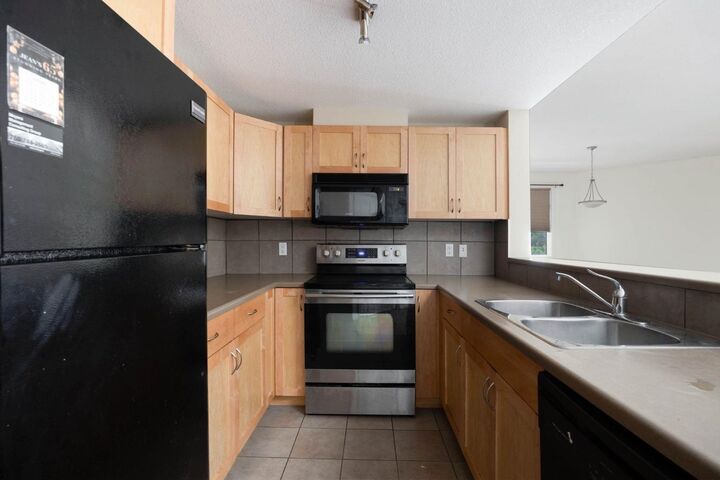 Property Photo:  108 Denholm Gate 401  AB T9H 0B3 