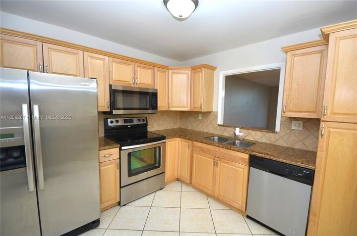 Property Photo:  404 NW 68th Ave 502  FL 33317 