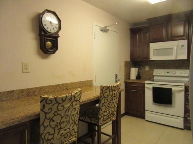 Property Photo:  10777 W Sample Rd 418  FL 33065 