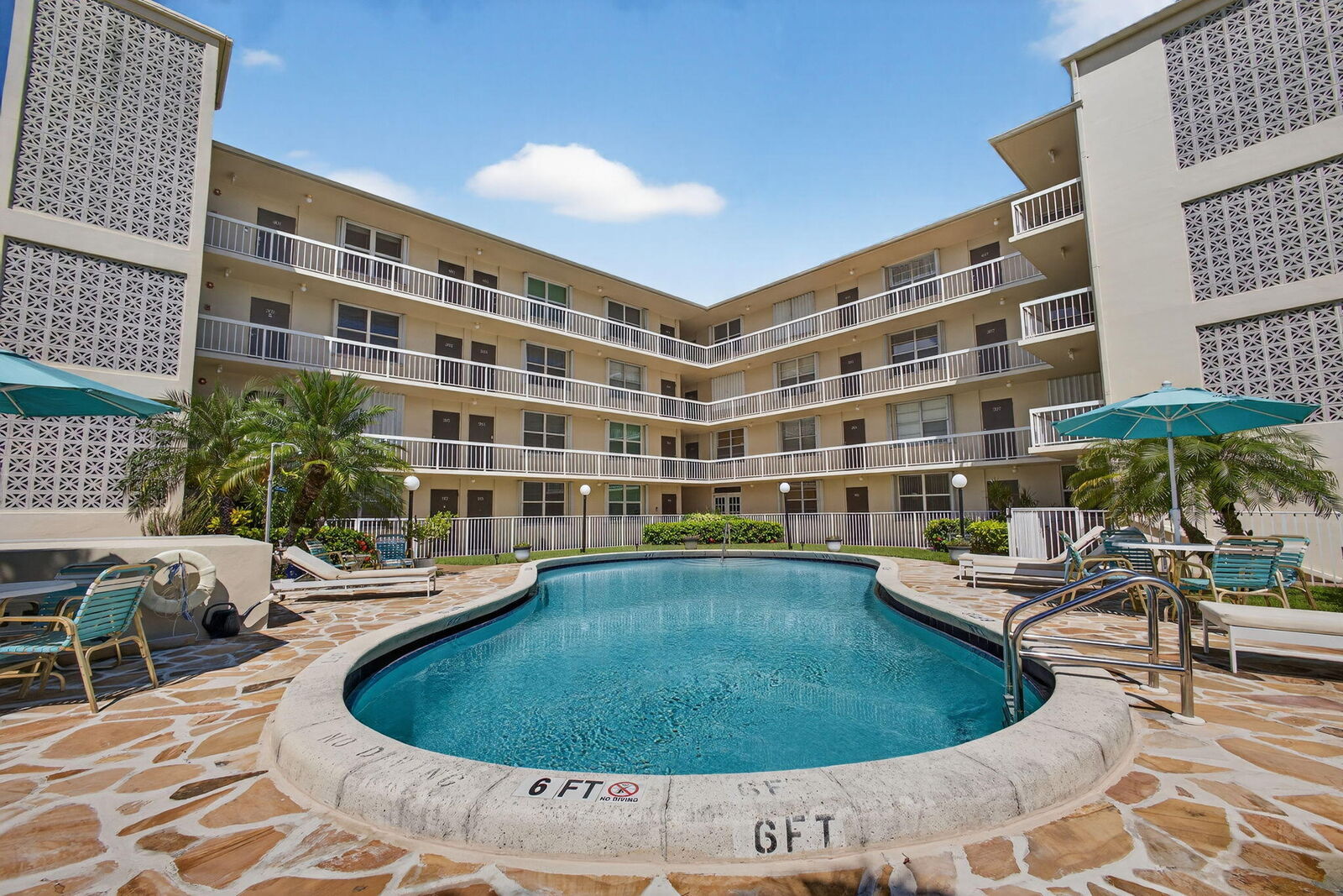 Property Photo:  1131 SE 4th Street 206  FL 33435 