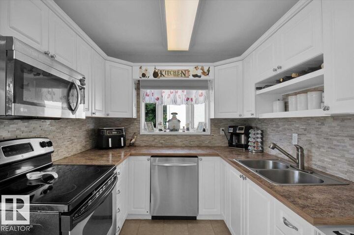 Property Photo:  15 Belleville Avenue  AB T7X 1J6 