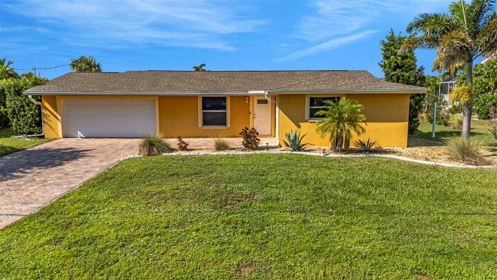 Property Photo: 115 Sinclair SE FL 33952