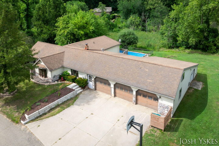 Property Photo: 5855 Grand River Drive NE MI 49301