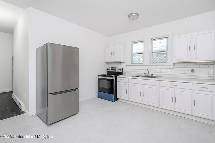 Property Photo: 16 Van Buren Street NY 10301