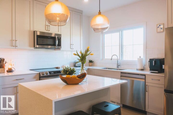 Property Photo: 3732 214 Street NW AB T6M 1S4