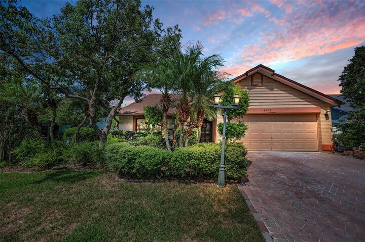 Property Photo: 8609 Thimbleberry Lane FL 33635