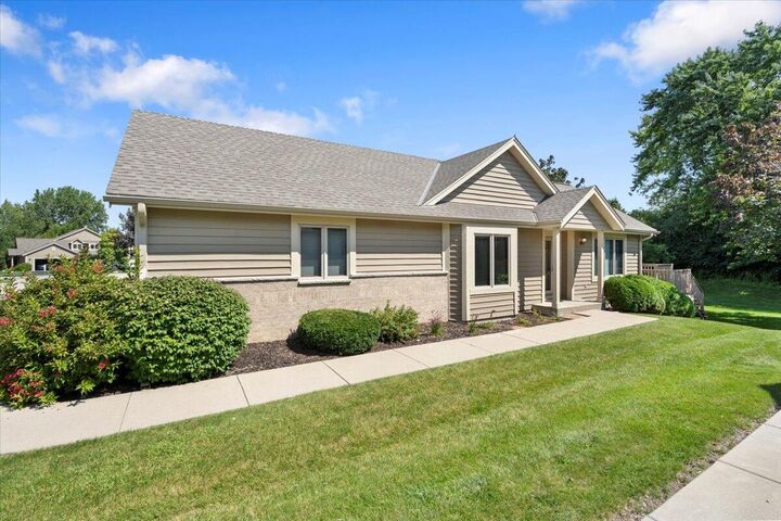 Property Photo: W240n2380 E Parkway Meadow Cir B WI 53072