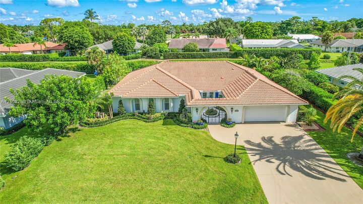 524 Muirfield Dr  Atlantis FL 33462 photo