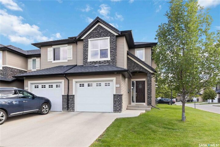 Property Photo: 410 Ledingham Way 205 SK S7V 0C4