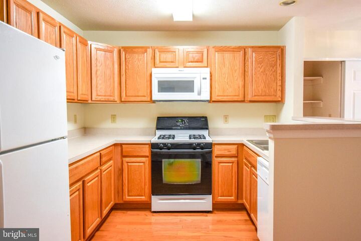 Property Photo:  45521 Westmeath Way E34  MD 20634 