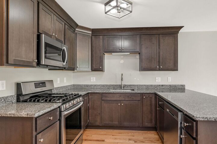 Property Photo:  3 Nutfield Court  NH 03038 