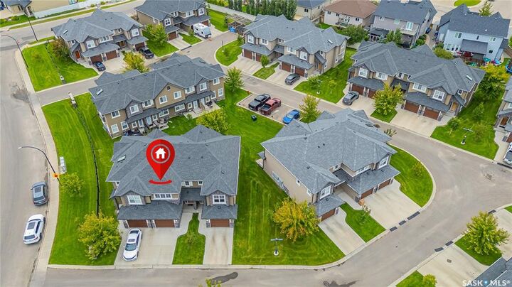 Property Photo: 1555 Paton Crescent 405 SK S7W 0V5
