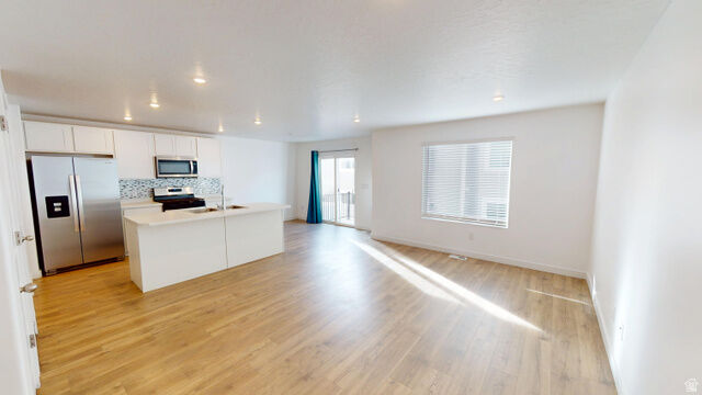 Property Photo: 1917 N Blue Iris Ave E 1090 UT 84074