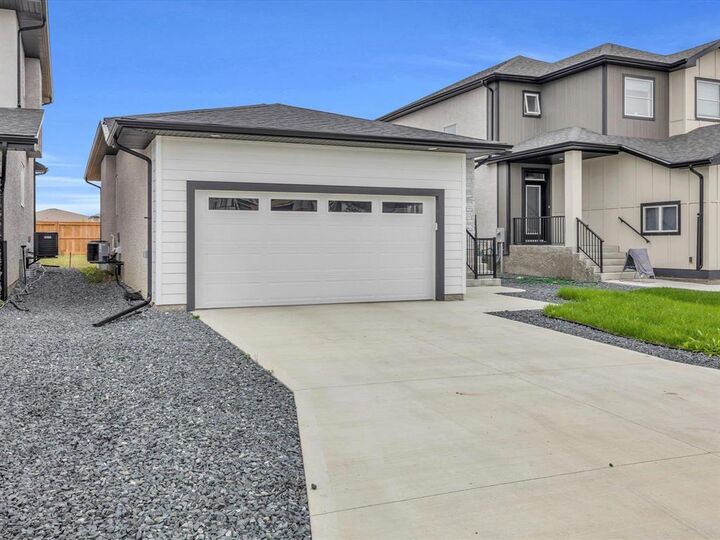 Property Photo:  110 Yasmin Ali Crescent  MB R3Y 2G6 